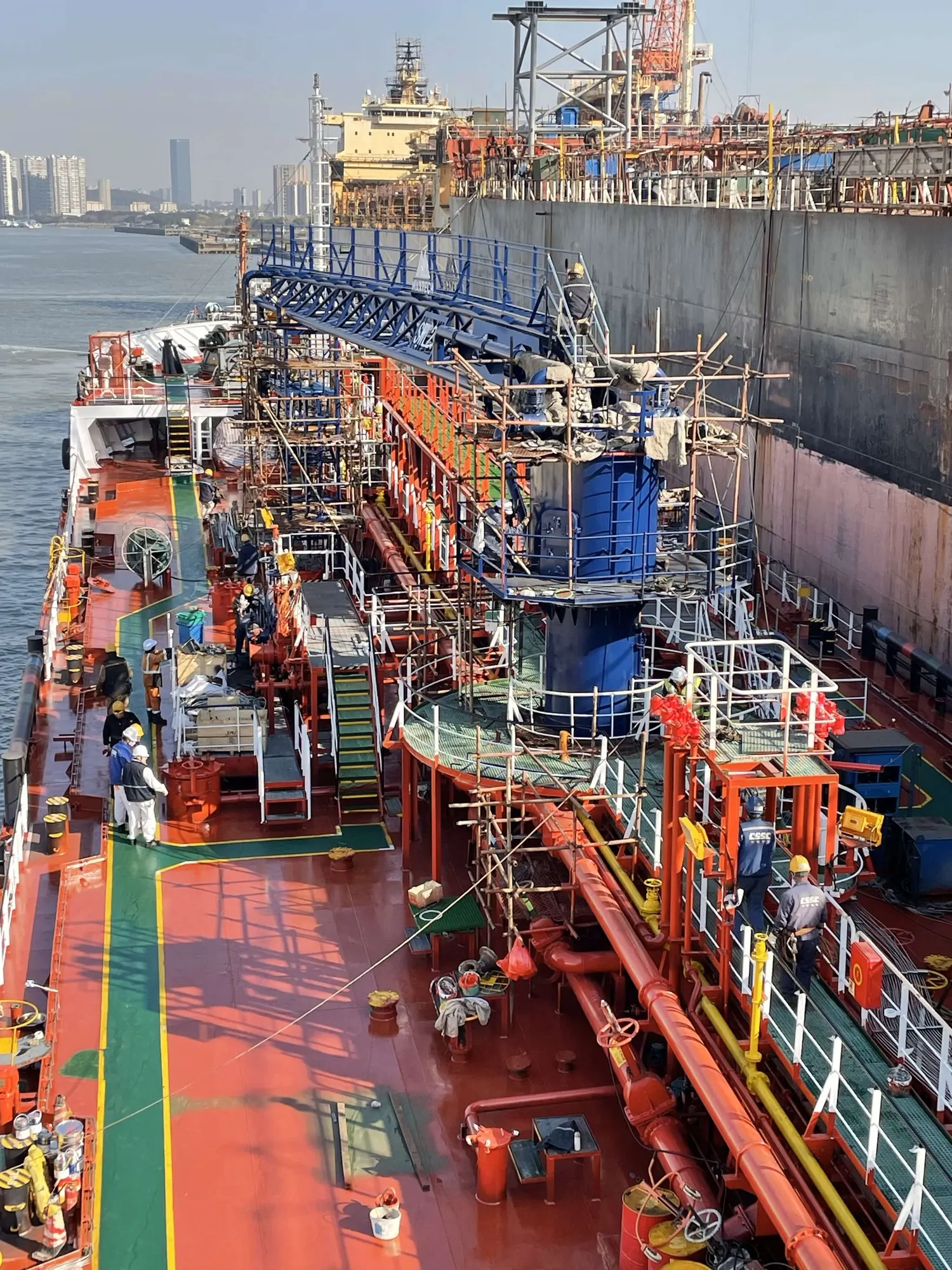 Her deck pipework and manifold connections seen looking aft, with the accommodation beyond.