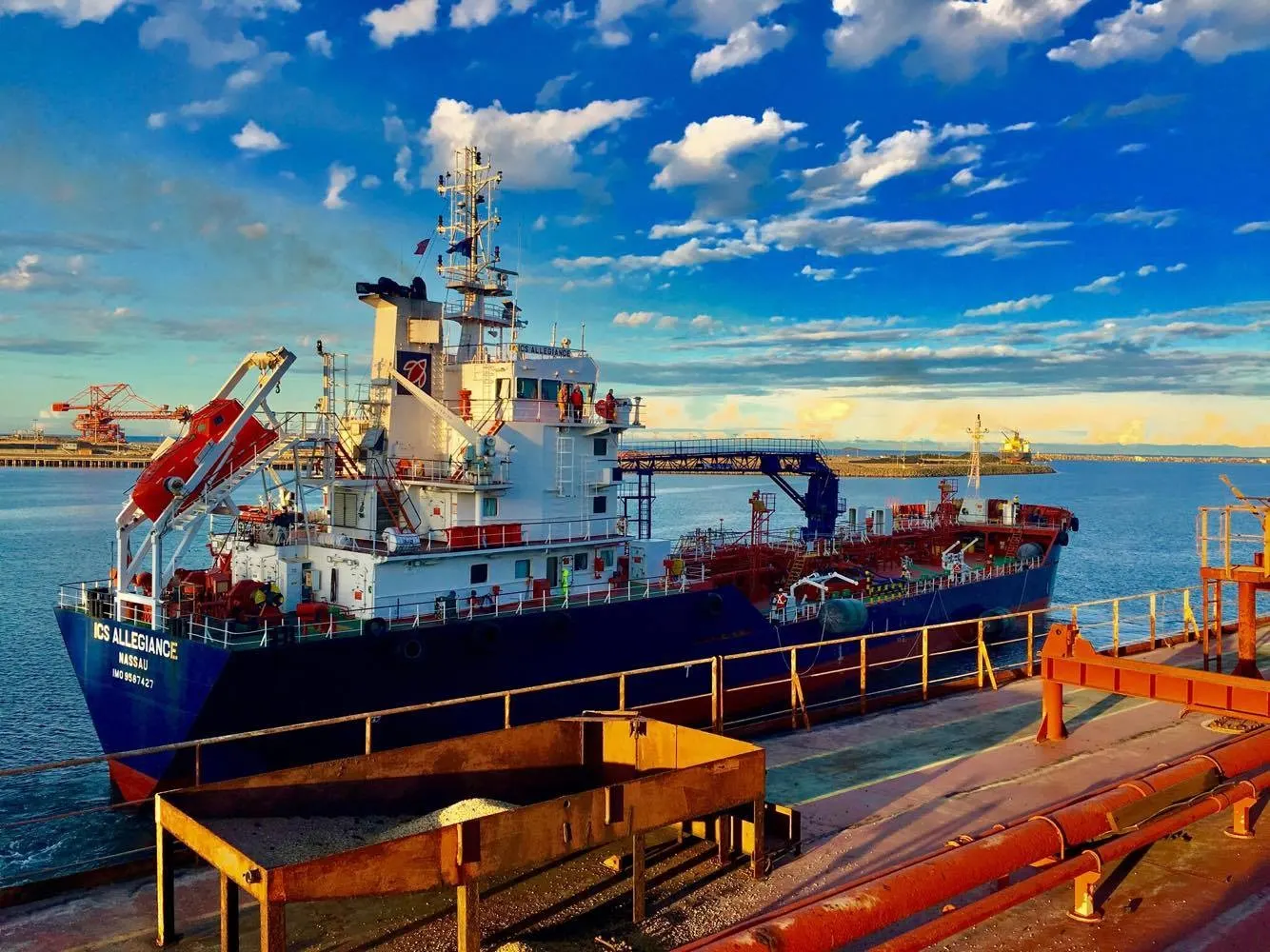 Looking aft along her deck to the bunkering manifold, moored against a bulk carrier at Port Kembla.