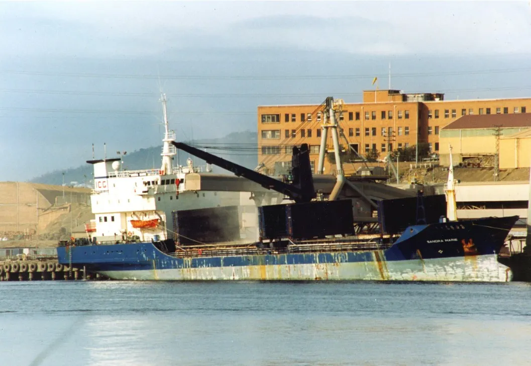 The Sandra Marie alongside, with her cargo crane deployed
