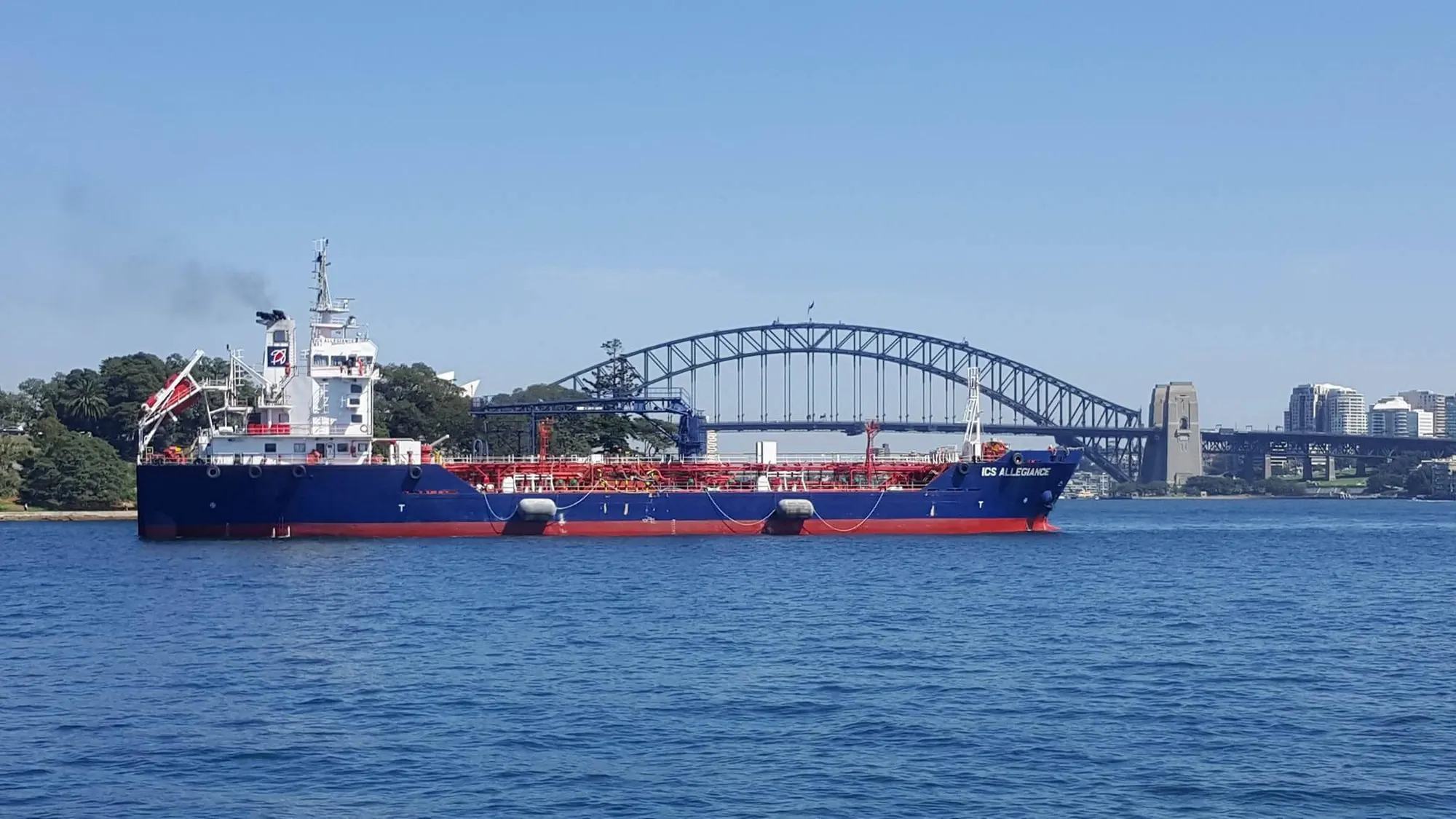 ICS Allegiance on Sydney Harbour, the Harbour Bridge standing behind her.